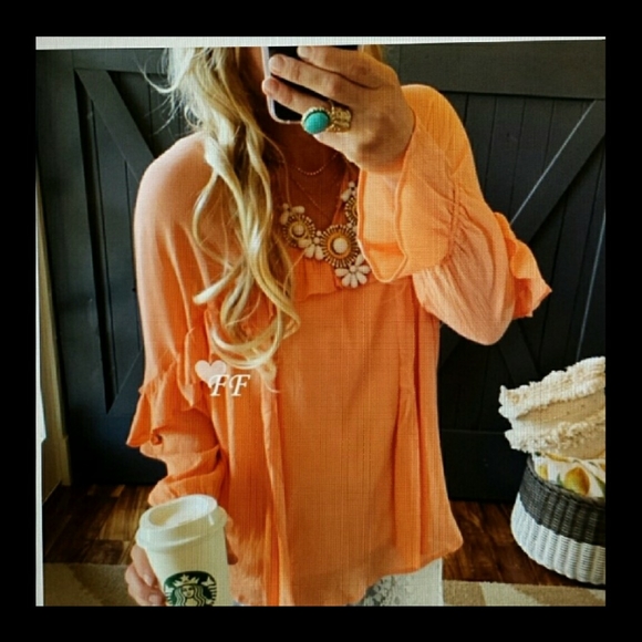 Private Label Tops - New Arrival. Ruffled long sleeve blouse